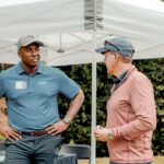 Golfers chatting, Tee IT Up for TechBridge 2021