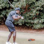 Golfer readying for a swing, Tee IT Up for TechBridge 2021